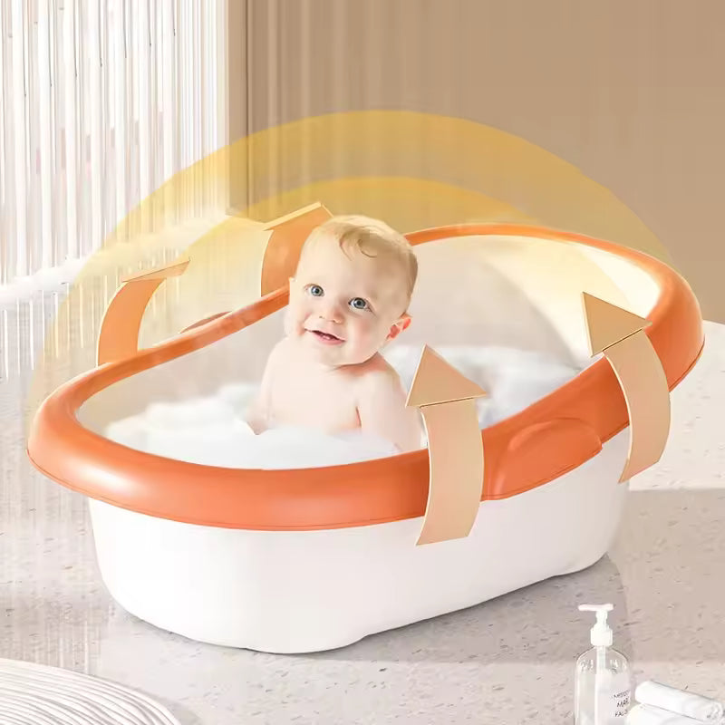 bébé assis baignoire bebe orange blanc